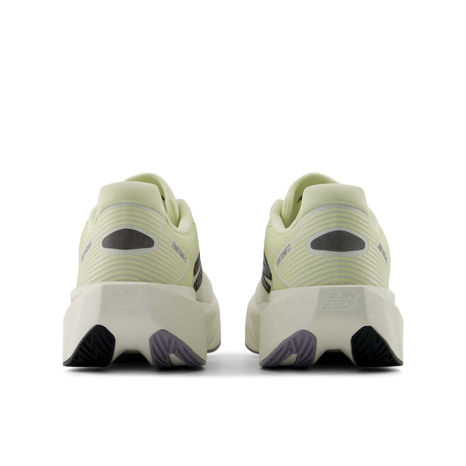 The back of a pair of New Balance Women's FuelCell Rebel V5 Running Shoes in the Pistachio Butter/Sea Salt colourway.