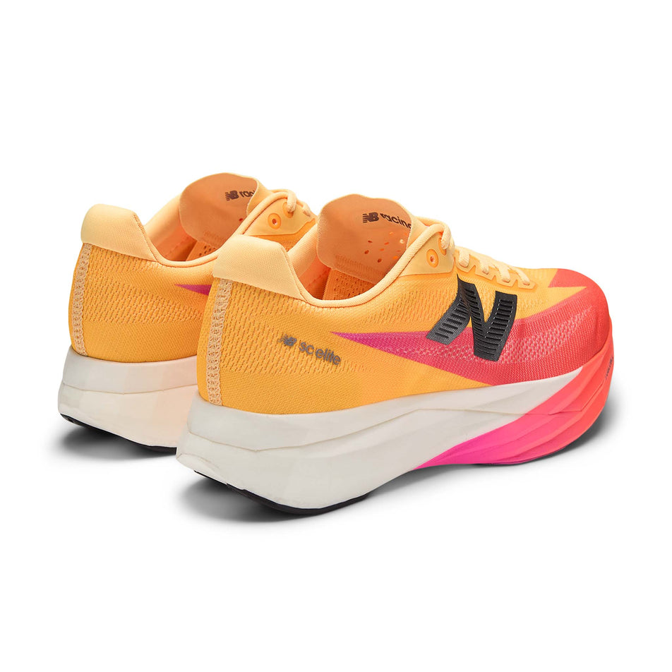 A pair of New Balance Women's FuelCell SuperComp Elite V5 Running Shoes in the Tangerine Heat colourway.