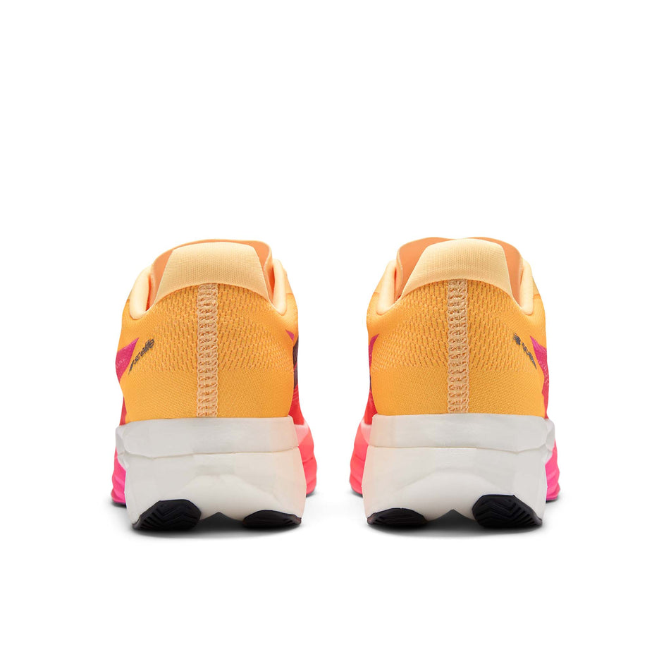 The back of a pair of New Balance Women's FuelCell SuperComp Elite V5 Running Shoes in the Tangerine Heat colourway.