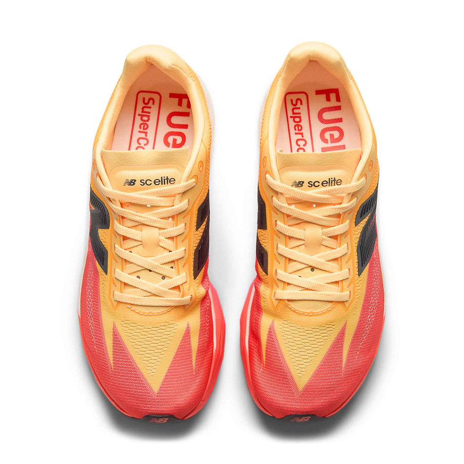 The uppers of a pair of New Balance Women's FuelCell SuperComp Elite V5 Running Shoes in the Tangerine Heat colourway.