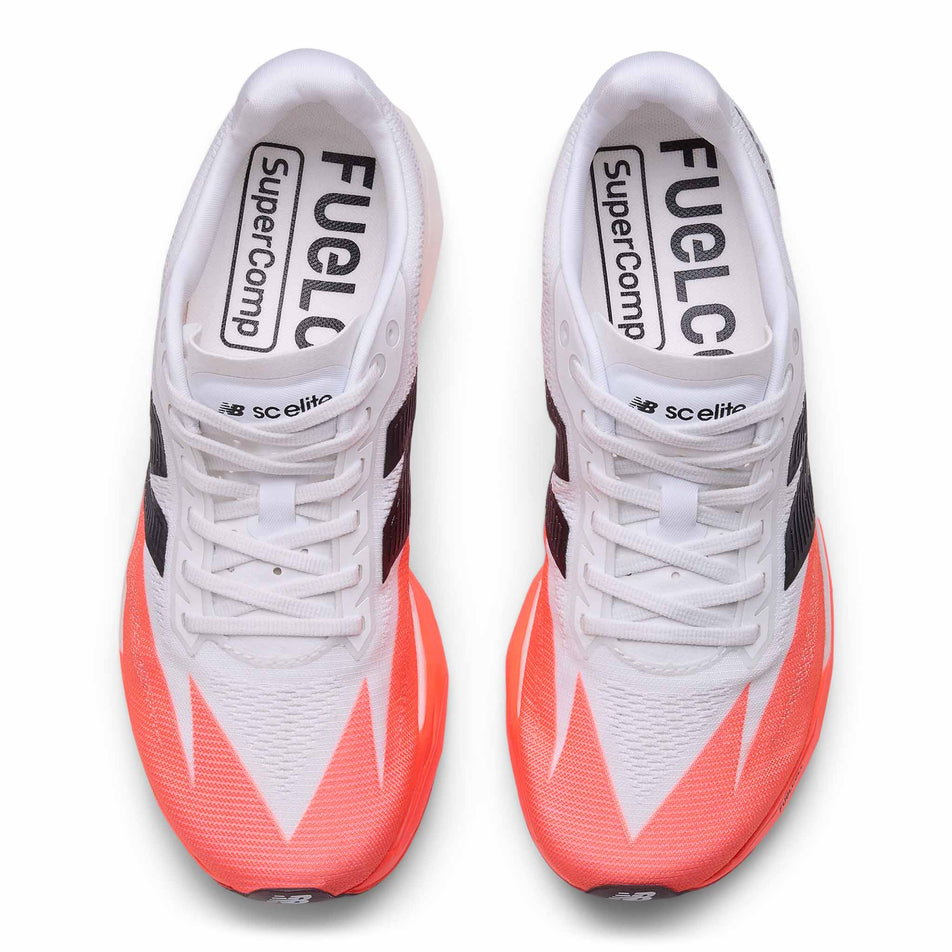The uppers of a pair of New Balance Women's FuelCell SuperComp Elite V5 Running Shoes in the Urgent Red colourway. (8722037670050)
