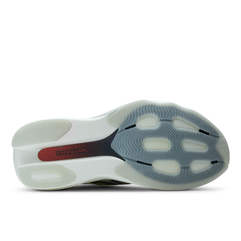 The outsole of the right shoe from a pair of New Balance Women's SC Rebel Running Shoes in the Sea Salt/Neo Flame colourway.