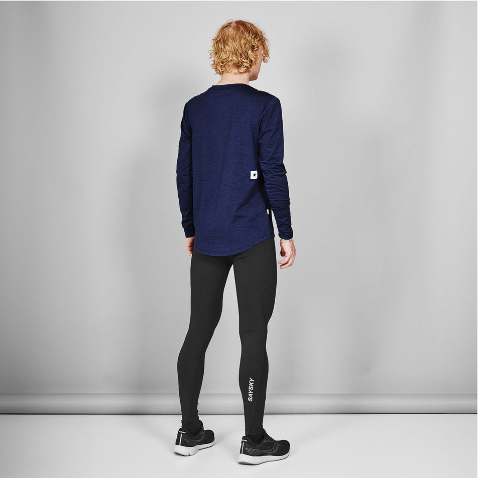 Back view of a model wearing the SAYSKY Men's Combat+ Long Tights in the Black colourway. (8731618902178)