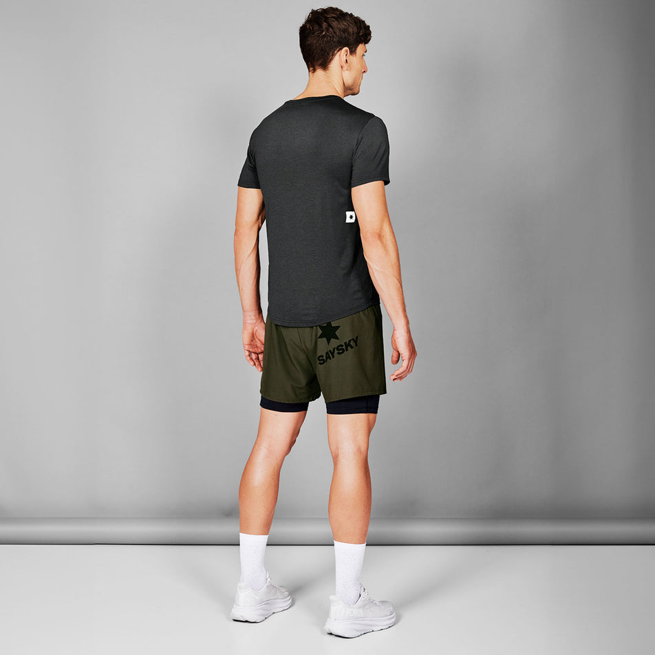 Back view of a model wearing the SAYSKY Men's Clean Pace T-Shirt in the Black colourway. (8731627225250)