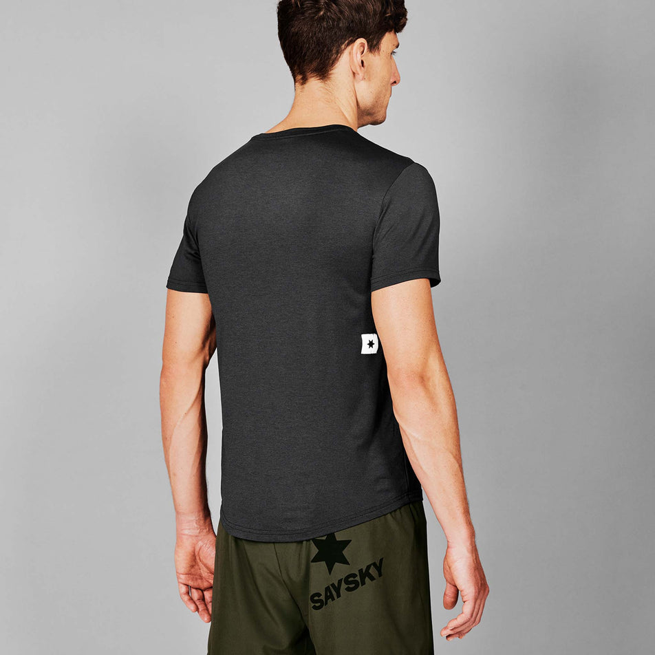 Back view of a model wearing the SAYSKY Men's Clean Pace T-Shirt in the Black colourway. (8731627225250)