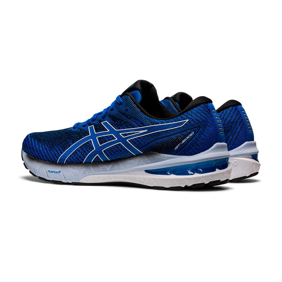 Lateral angled view of men's asics gt-2000 10 running shoes in blue (7601223958690)