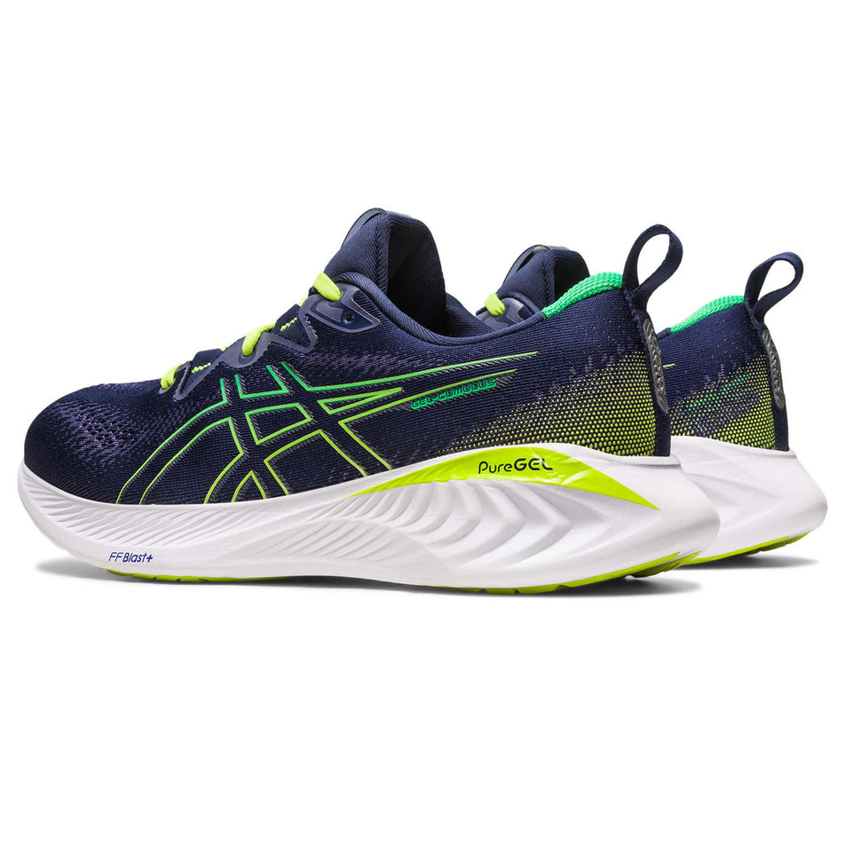 Angled back view of a pair of Asics Men's Gel-Cumulus 25 Running Shoes in the Midnight/Cilantro colourway (7900866281634)