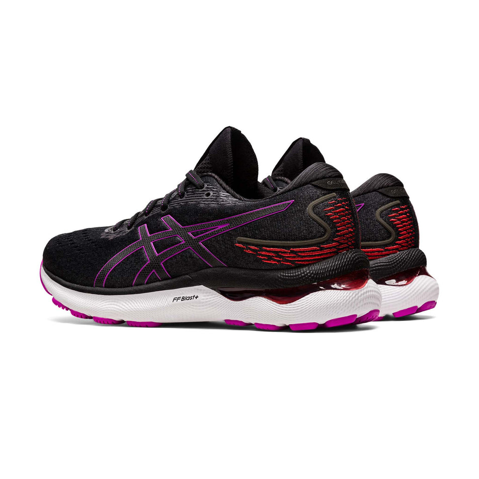 Lateral angled view of women's asics gel-nimbus 24 running shoes in black (7520651378850)