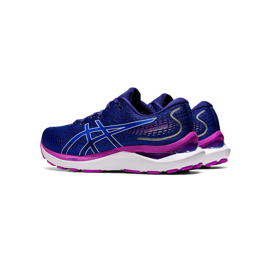 Lateral angled view of women's asics gel-cumulus 24 running shoes in blue (7520599539874)