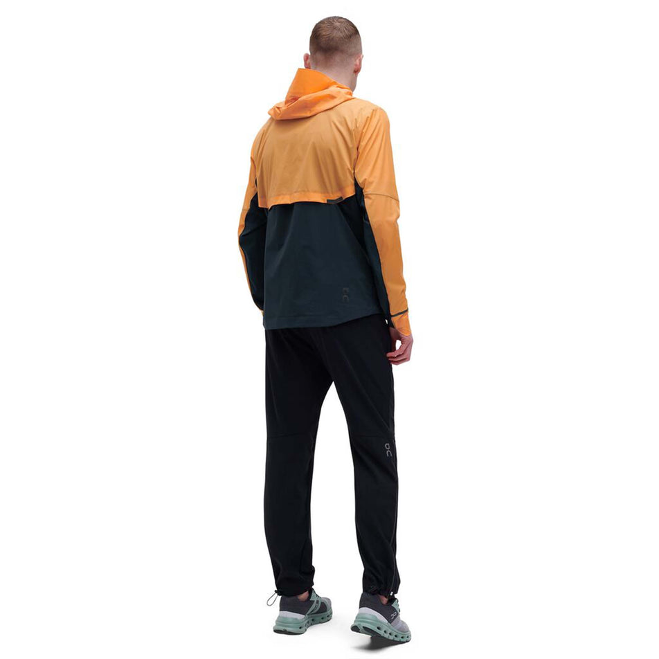 Back model view of men's on weather jacket in orange (7518271242402)