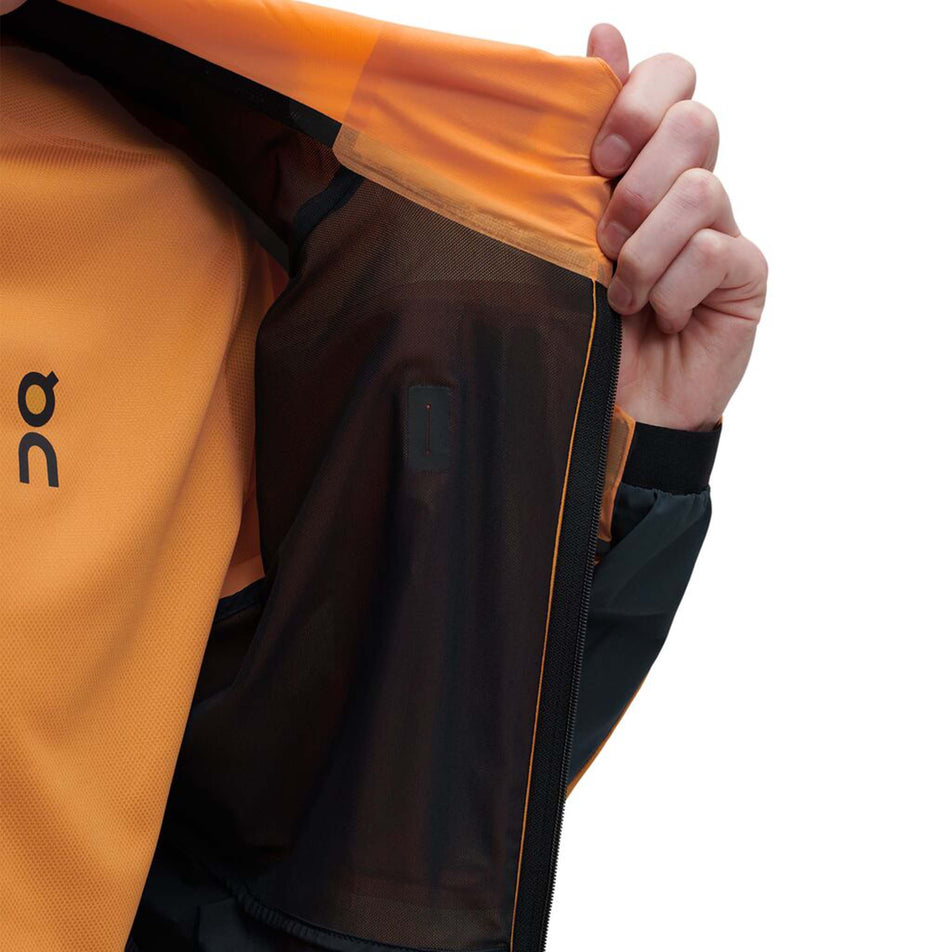 Inner material view of men's on weather jacket in orange (7518271242402)