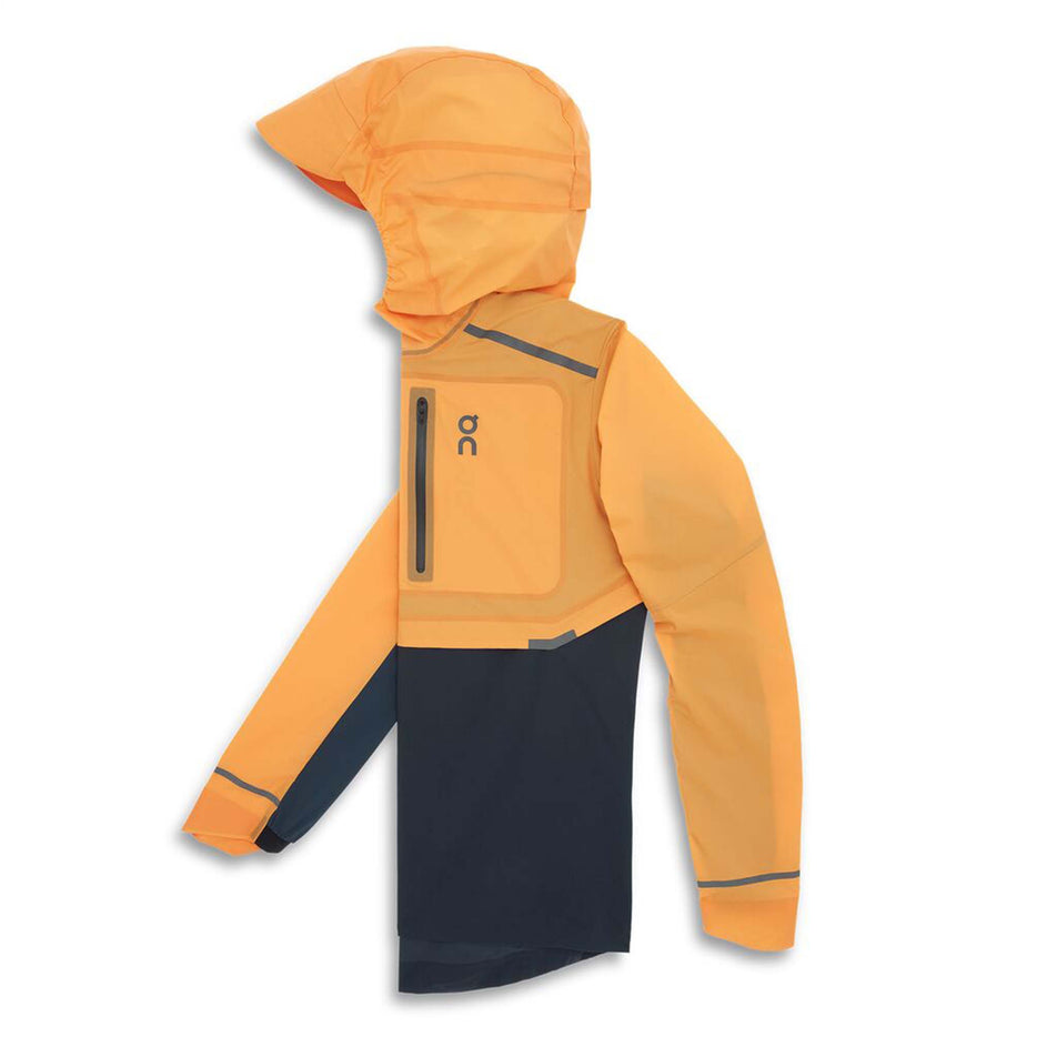 Folded view of men's on weather jacket in orange (7518271242402)