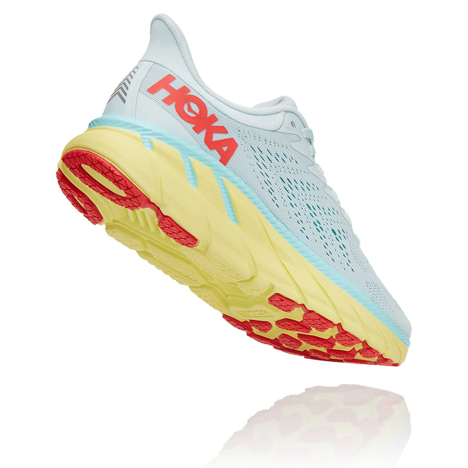 The lateral side and outsole of the right shoe from a pair of women's Hoka Clifton 7 Wide in a slanted position (6901825732770)