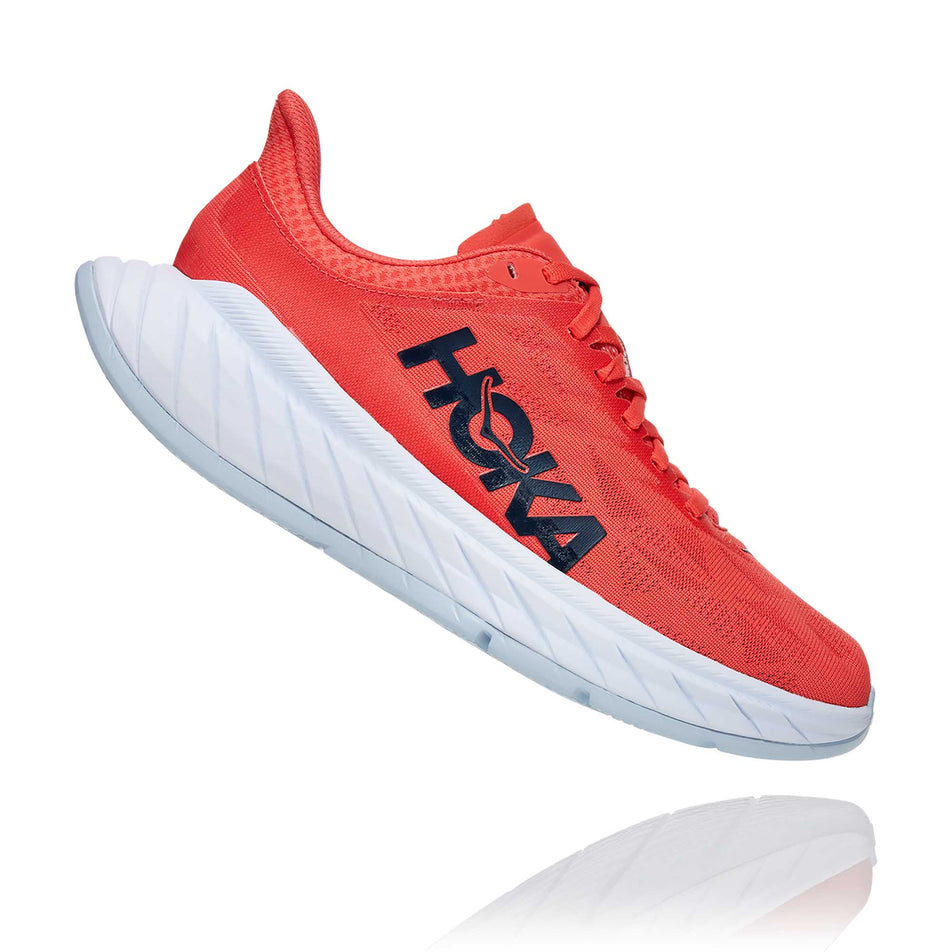 The right shoe from a pair of women's Hoka Carbon X 2 in a slanted position (6901956018338)