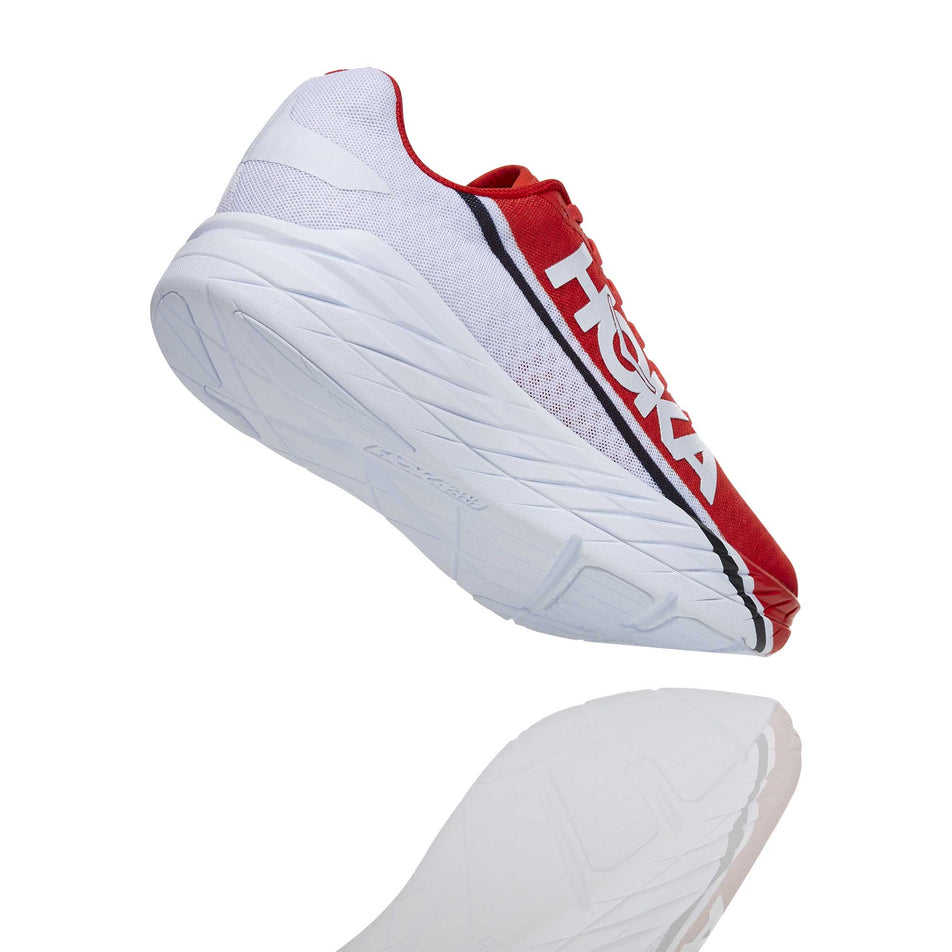 The lateral side and full outsole on the right shoe from a pair of unisex Hoka Rocket X  in a slanted position (6901891825826)