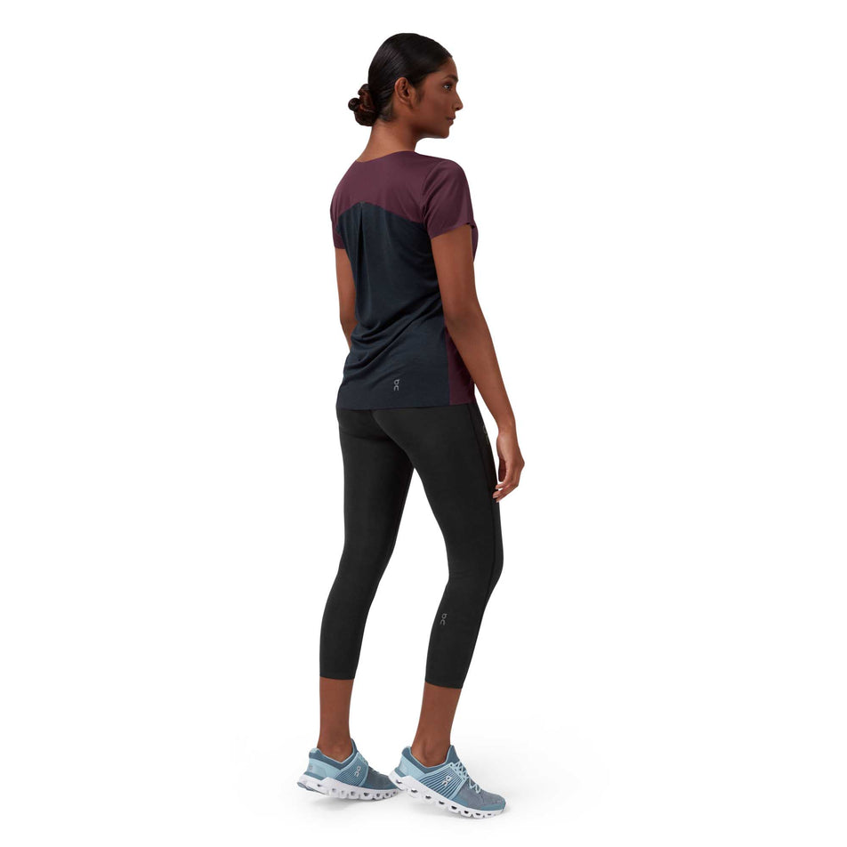 Back view of woman wearing On Performance S/S T-Shirt. (6993690558626)