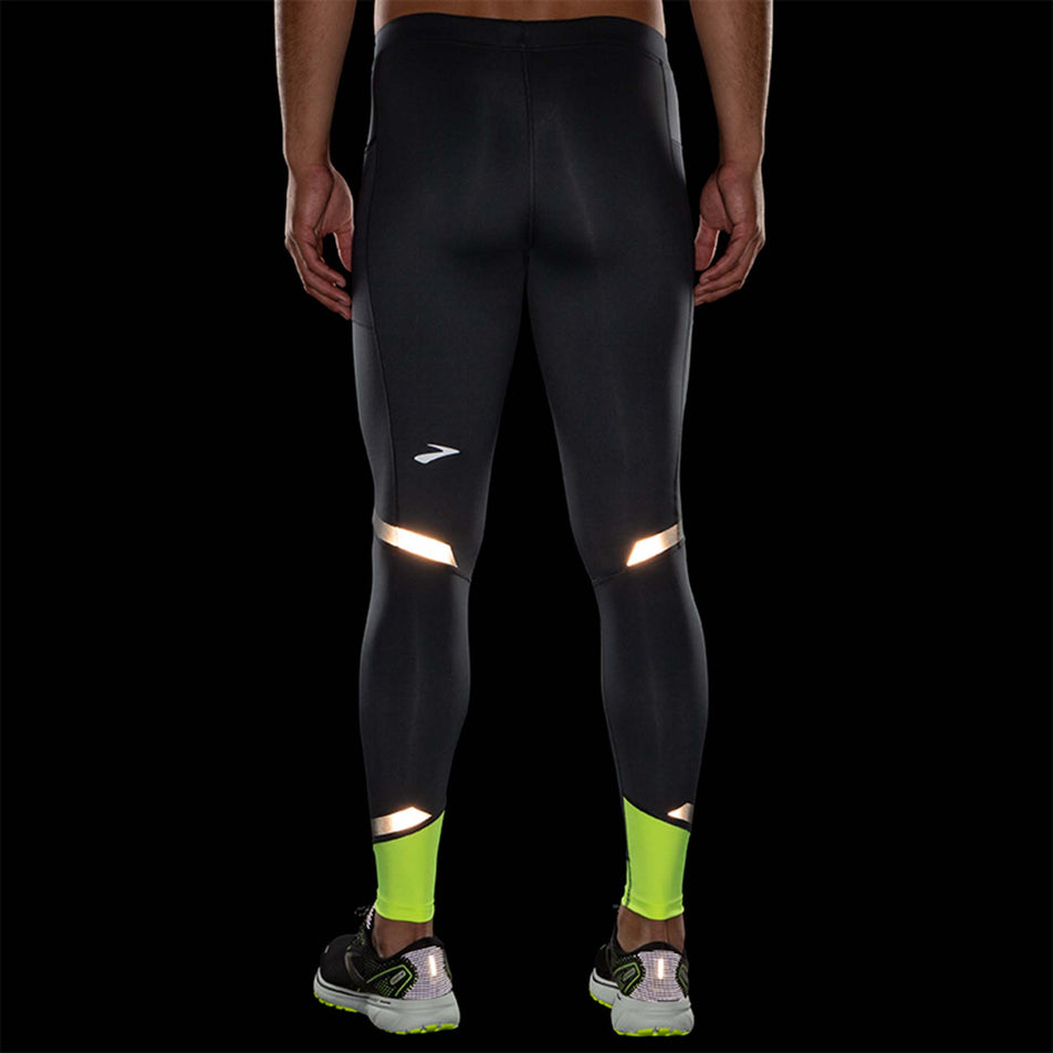 Rear reflective view of Brooks Men's Run Visible Tight in black (7599112880290)