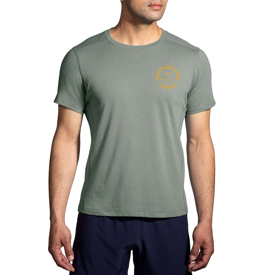 Front view of a model wearing a Brooks Men's Distance Short Sleeve 2.0 T-Shirt (7778559459490)