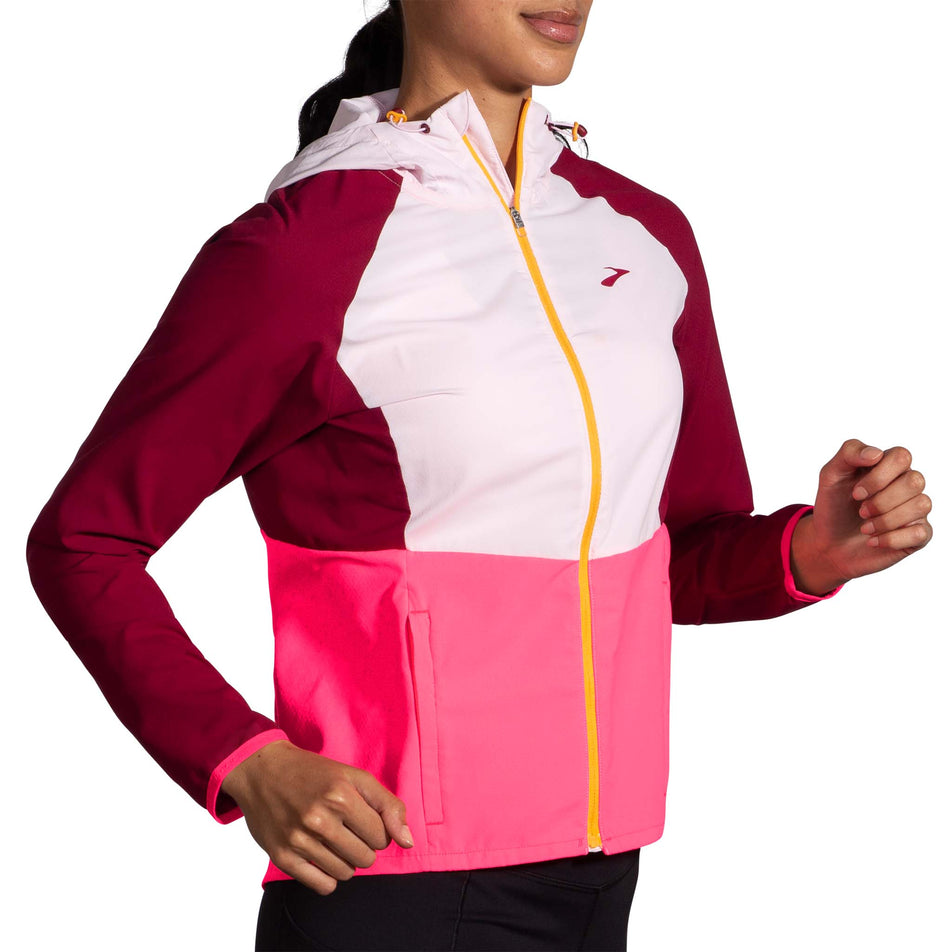 Front view of a model wearing a Brooks Women's Canopy Jacket (7778531082402)