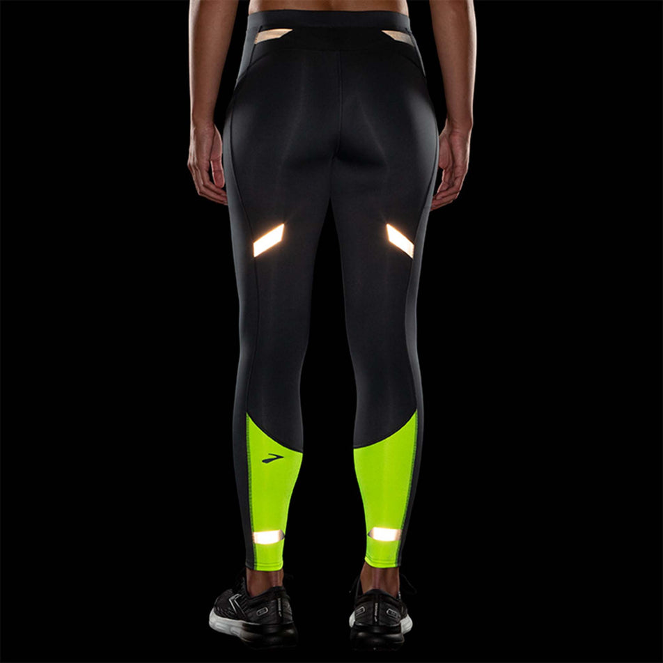 Rear reflective view of Brooks Women's Run Visible Tight in black (7599101509794)