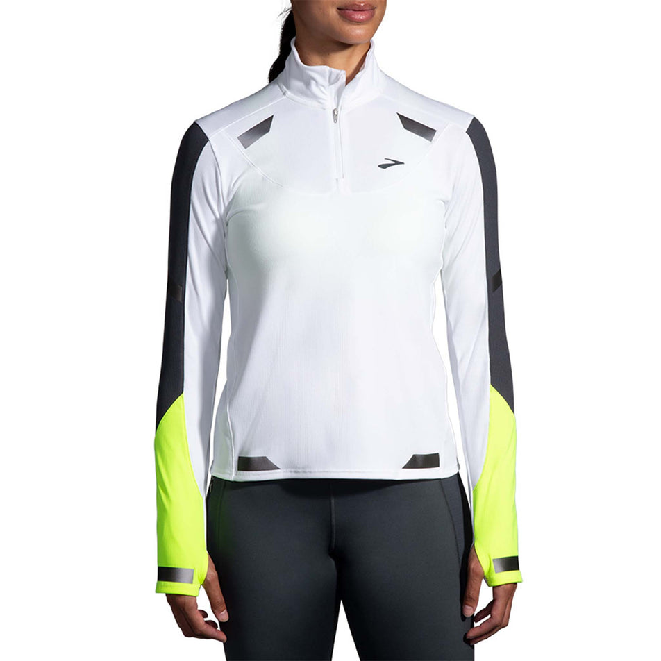 Front model view of Brooks Women's Run Visible 1/2 Zip in white (7596658196642)