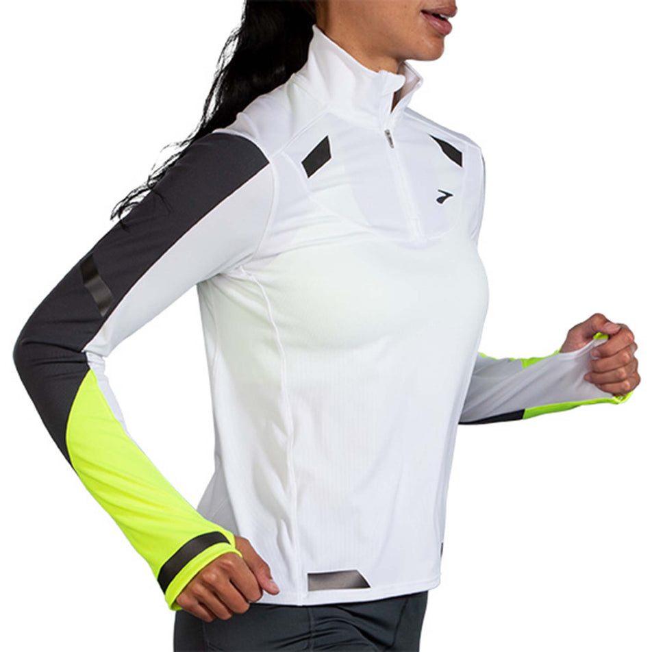 Side view of Brooks Women's Run Visible 1/2 Zip in white (7596658196642)