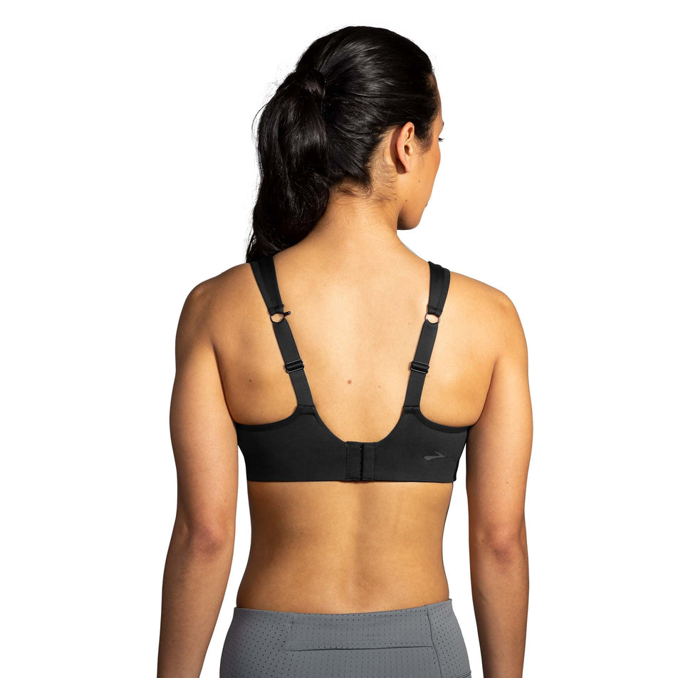 Back view of a model wearing a Brooks Drive Convertible Run Bra (7319321378978)