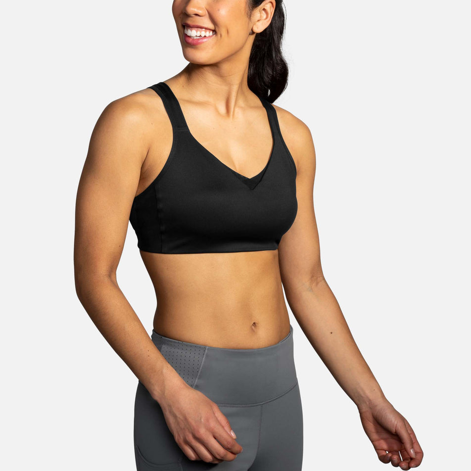 Front view of a model wearing a Brooks Drive Convertible Run Bra (7319321378978)