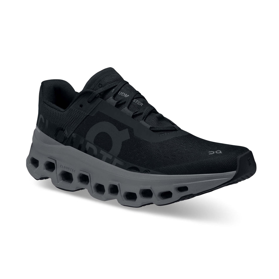 Right shoe anterior angled view of On Women's Cloudmonster Running Shoes in black (7724309774498)
