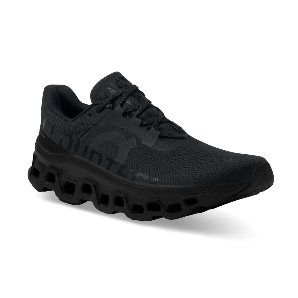 Right shoe anterior angled view of On Men's Cloudmonster Running Shoes in black (7724308431010)