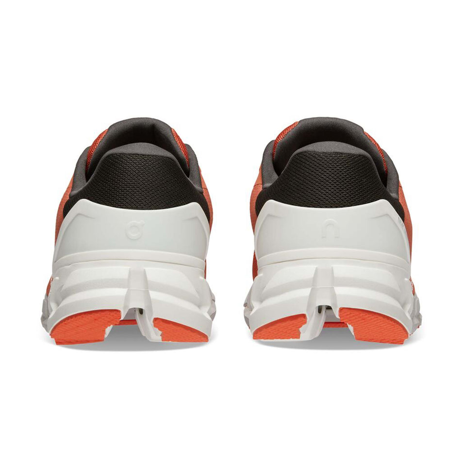 Pair posterior view of On Men's Cloudflyer 4 Running Shoes in orange (7671578591394)
