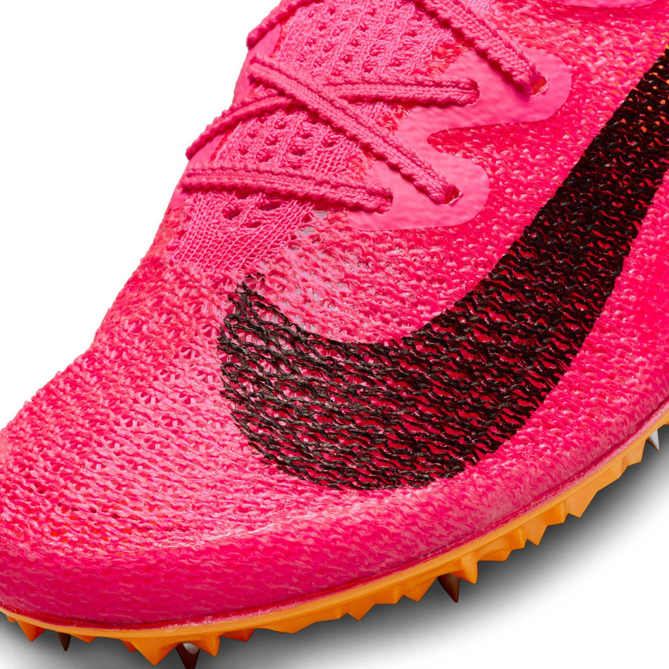 The lateral side of the toe box on the left shoe from a pair of Nike Unisex Zoom Superfly Elite 2 Track & Field Sprinting Spikes (7875622142114)