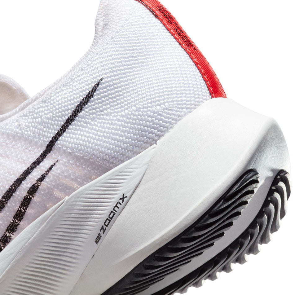 The medial side of the heel unit on the right shoe from a pair of men's Nike Air Zoom Tempo NEXT% road running shoes (7725363789986)