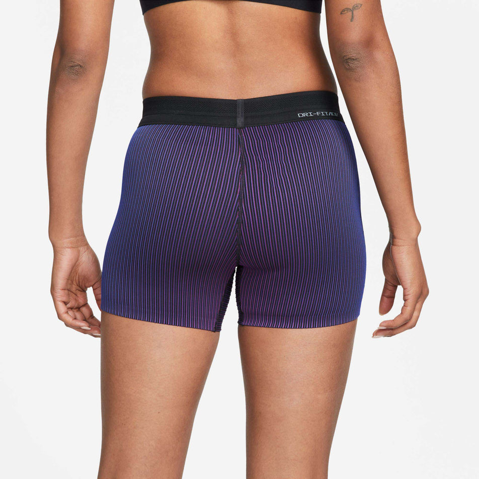 Behind view of women's nike df adv tight short (7386206339234)