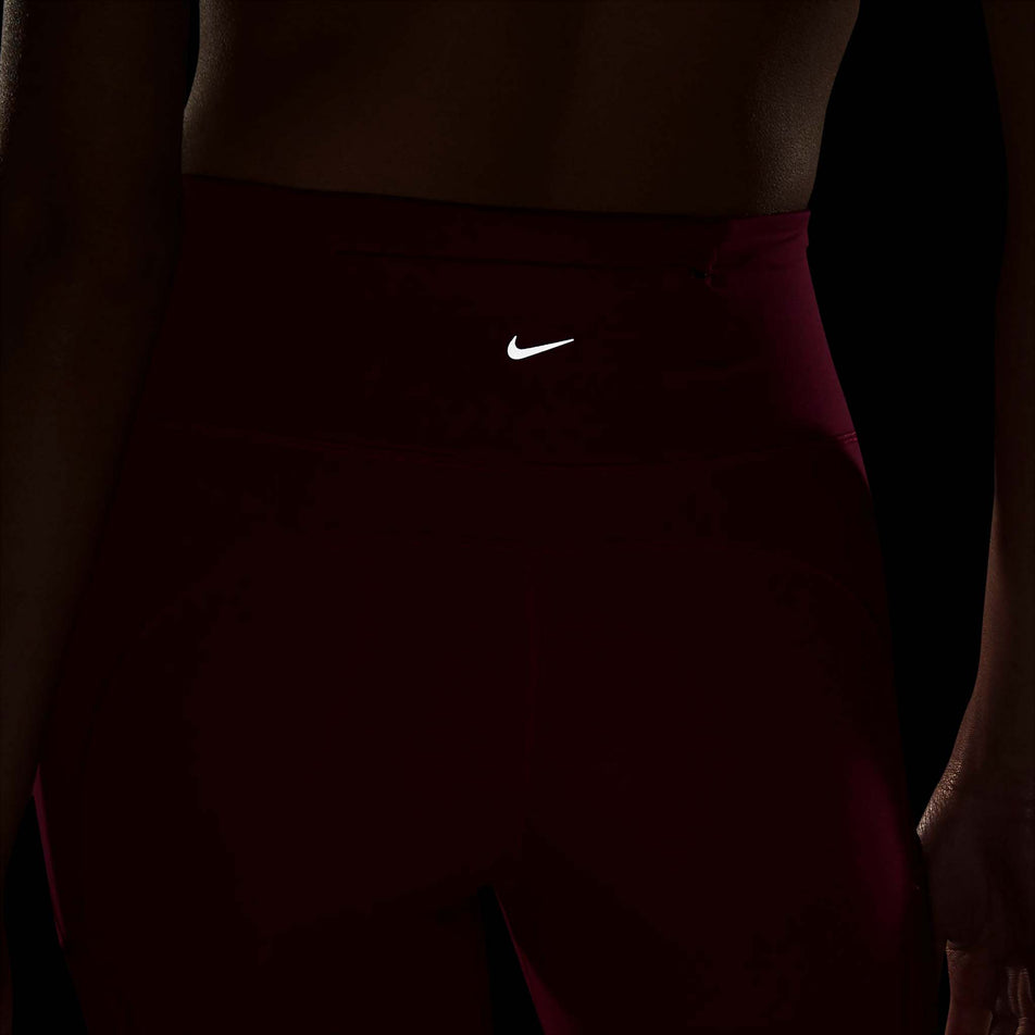 Reflective logo view of women's nike epic luxe tight (7247703736482)