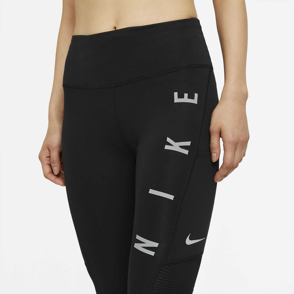 The front of a model wearing the women's Nike Run Division Epic Fast Tight GX (6936939724962)