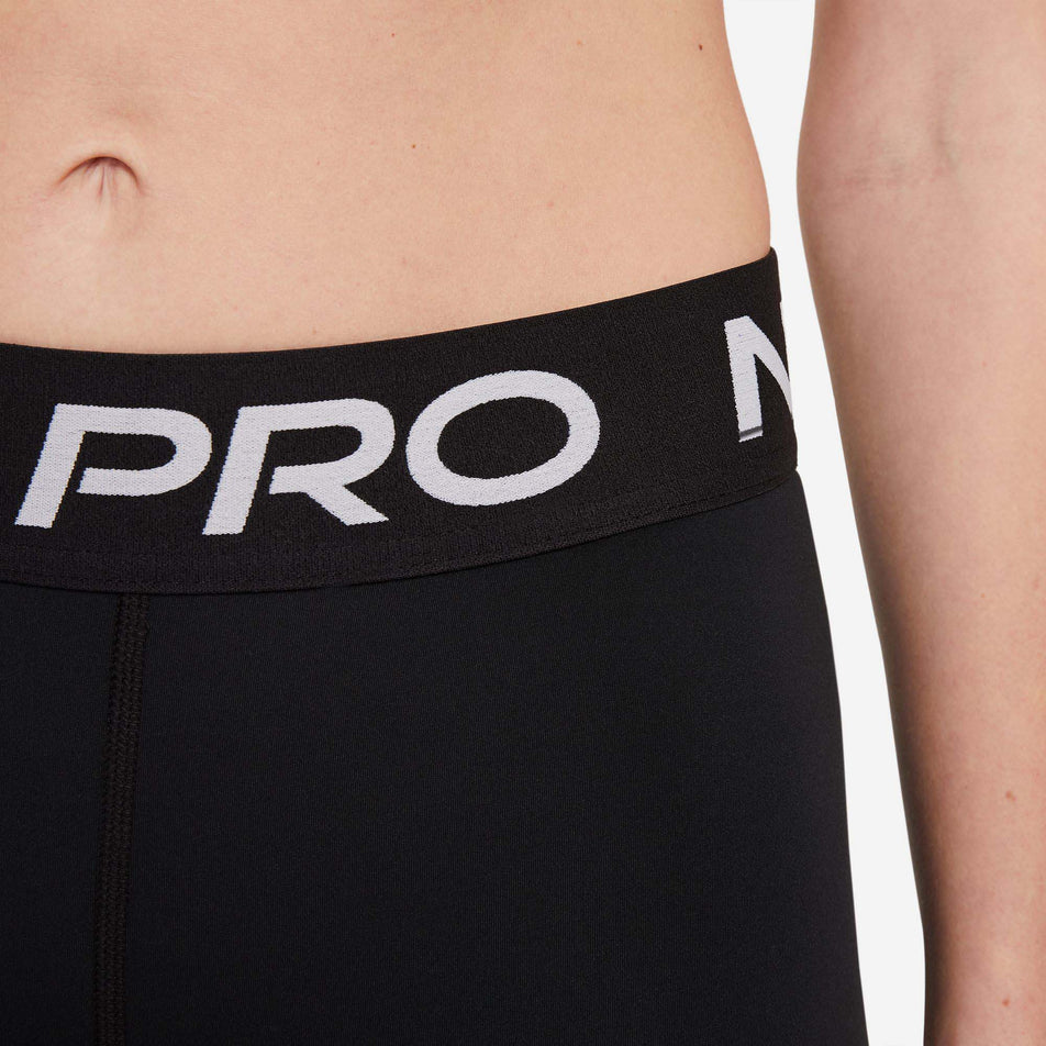 Waistband view of Nike Women's NP 365 Short 5 Inch in black. (7729545478306)