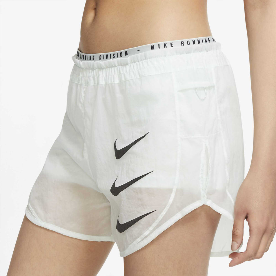Side logo view of women's nike run division tempo luxe 2 in 1 short (6937083281570)