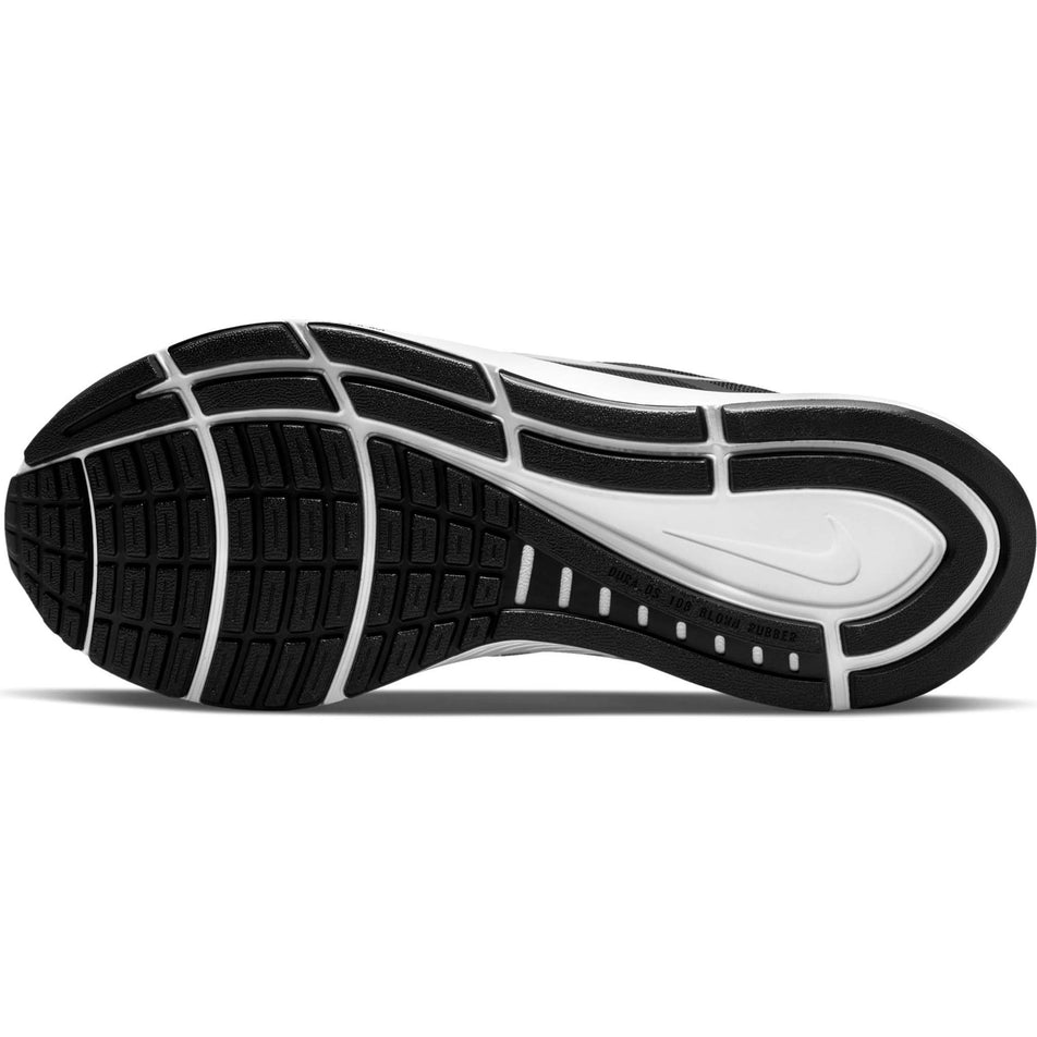 Outsole of the left shoe from a pair of women's Nike Air Zoom Structure 24 Running Shoes (7353684787362)