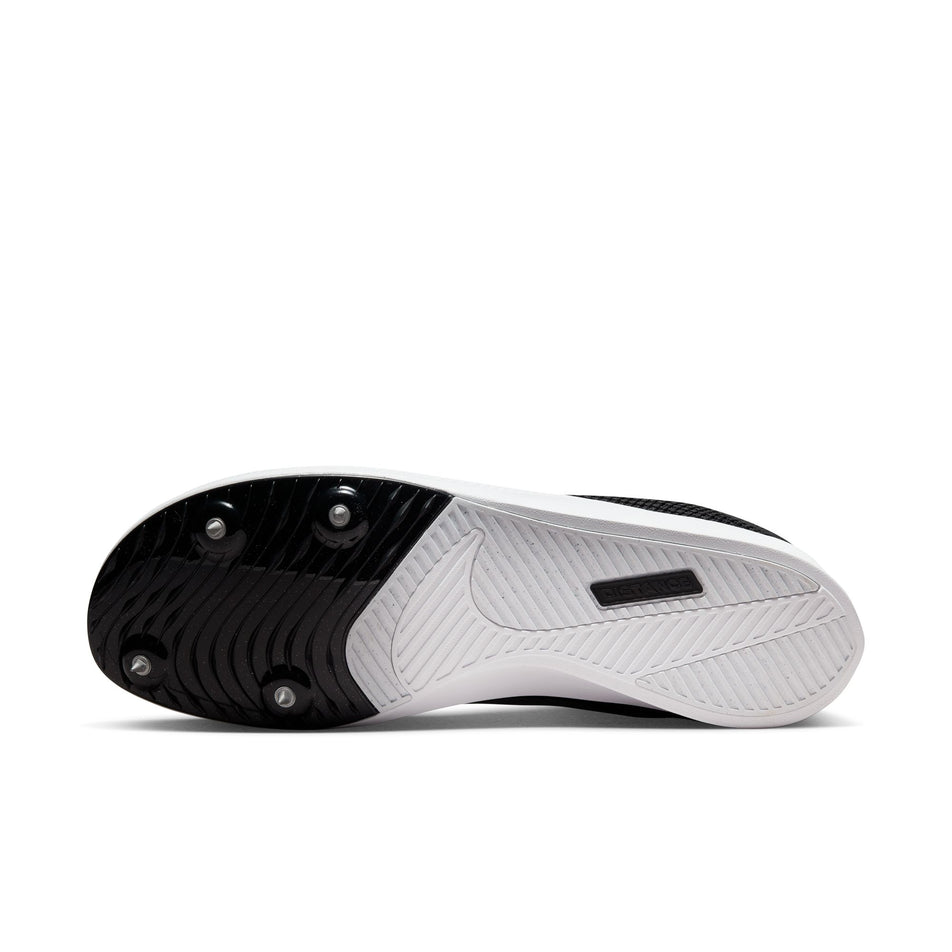 The outsole of the left shoe from a pair of Nike Unisex Zoom Rival Distance Track Spikes (7669984493730)