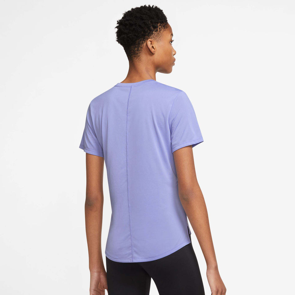 Behind view of women's nike one dri-fit ss std top (7492274454690)