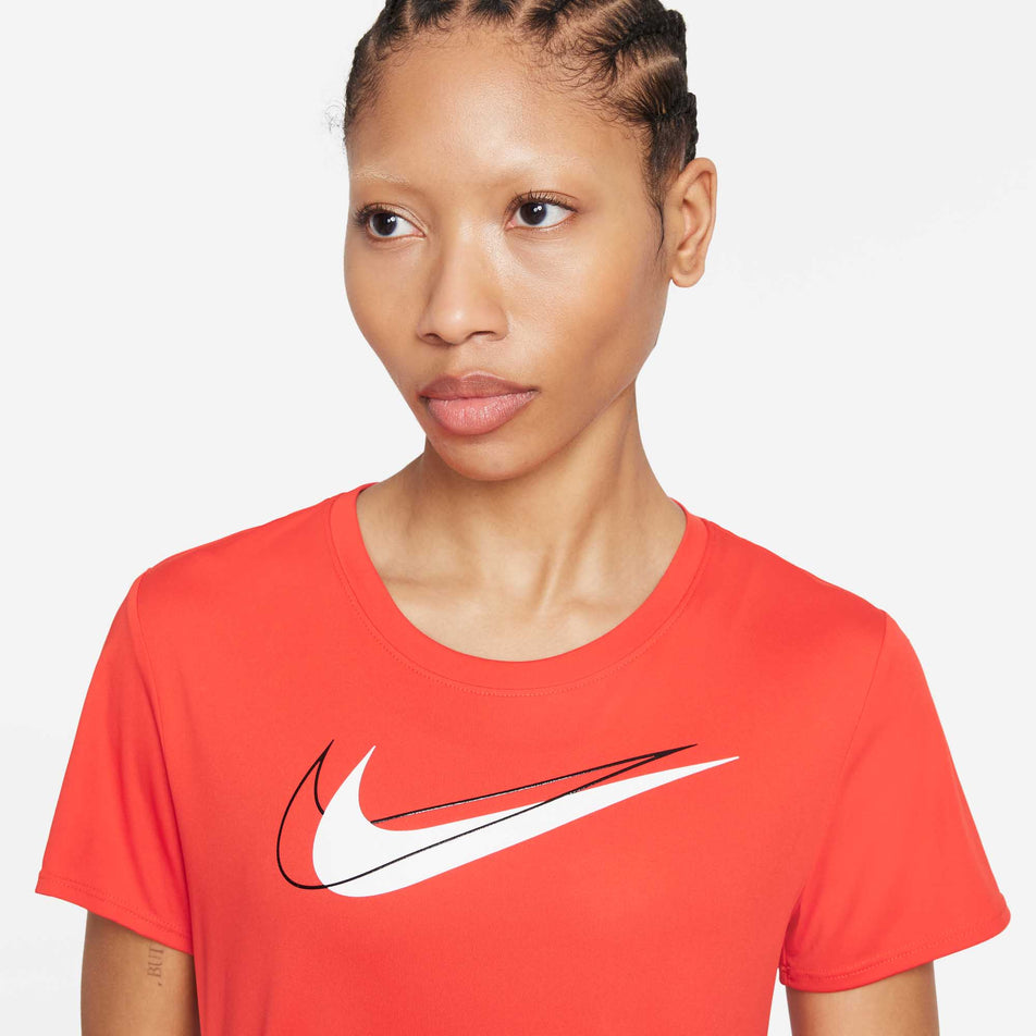 Model wears Nike Dri-Fit Swoosh Run Top (6918031835298)