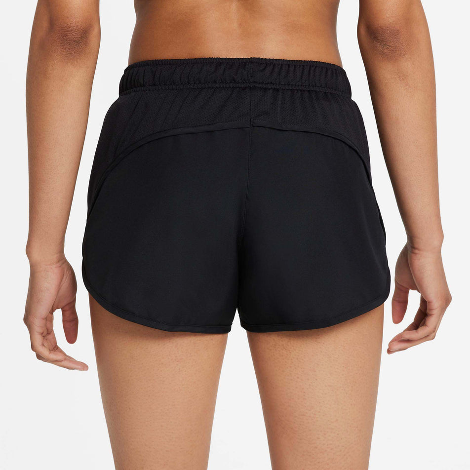 Close-up back view of a model wearing a pair of Nike Women's Dri-FIT Tempo Race Brief-Lined Running Shorts (7876347134114)
