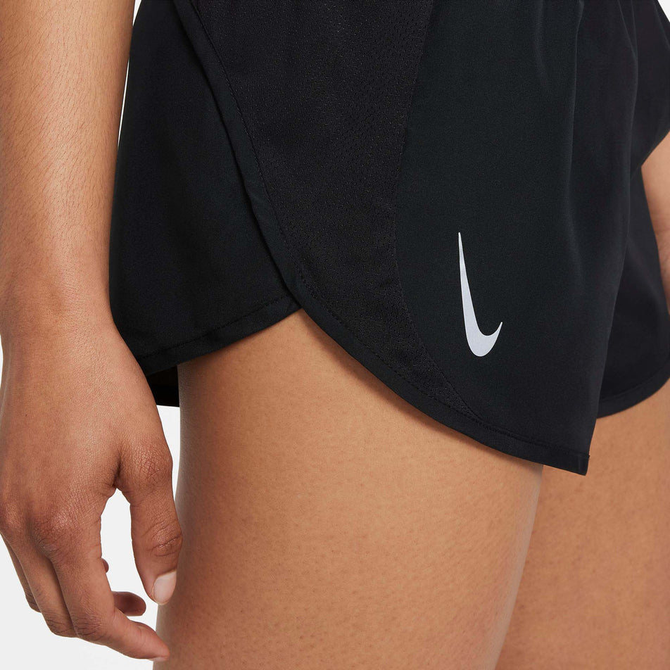 Close-up side view of a model wearing a pair of Nike Women's Dri-FIT Tempo Race Brief-Lined Running Shorts (7876347134114)