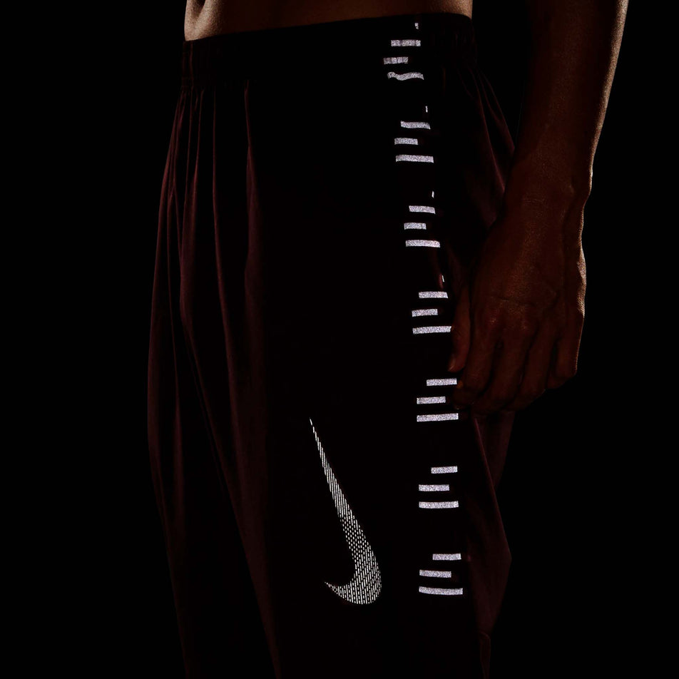 Reflective view of men's nike df challenger woven flash pant (7247377924258)