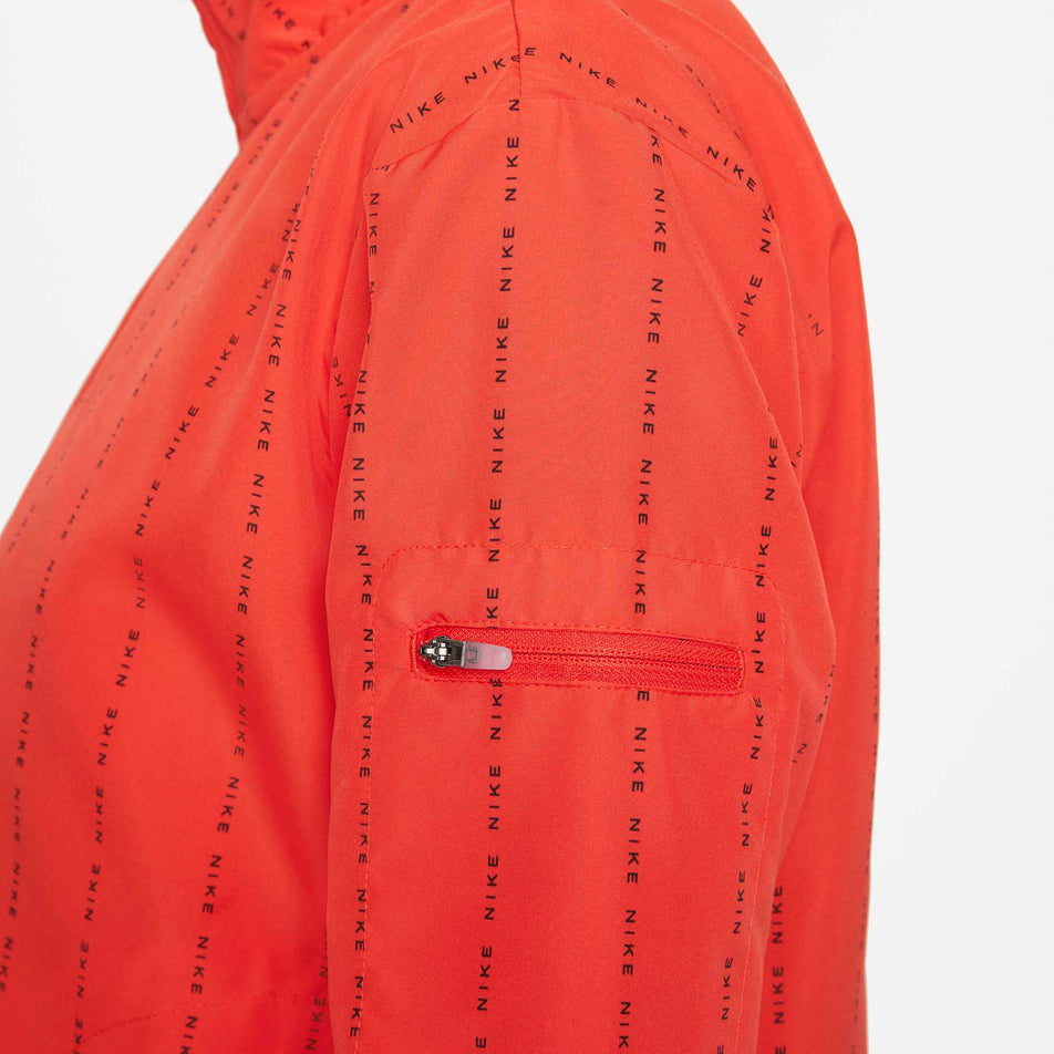 Zip Pocket view of women's nike dri-fit icon clash jacket (6918046122146)