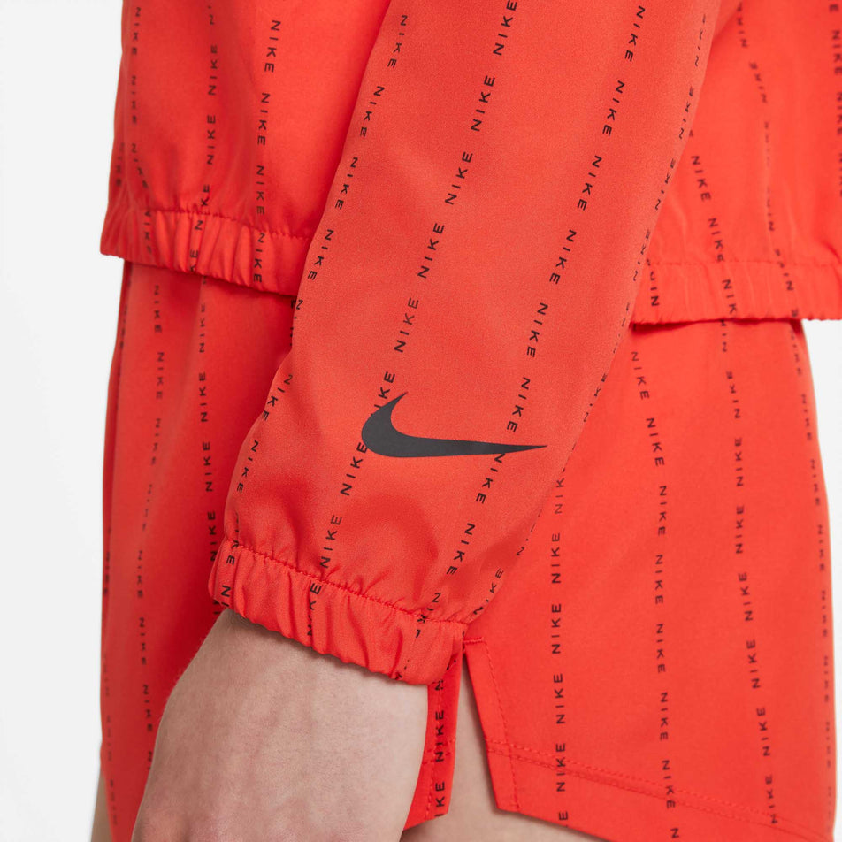 Logo view of women's nike dri-fit icon clash jacket (6918046122146)
