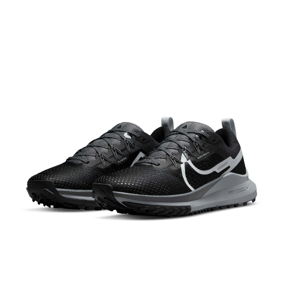 Pair anterior angled view of Nike Women's React Pegasus Trail 4 Running Shoes in black. (7728658645154)