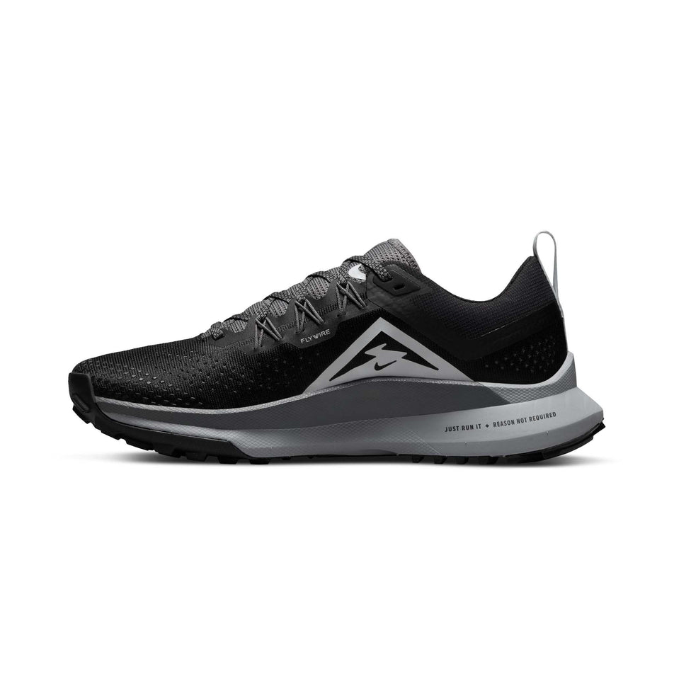 Right shoe medial view of Nike Women's React Pegasus Trail 4 Running Shoes in black. (7728658645154)