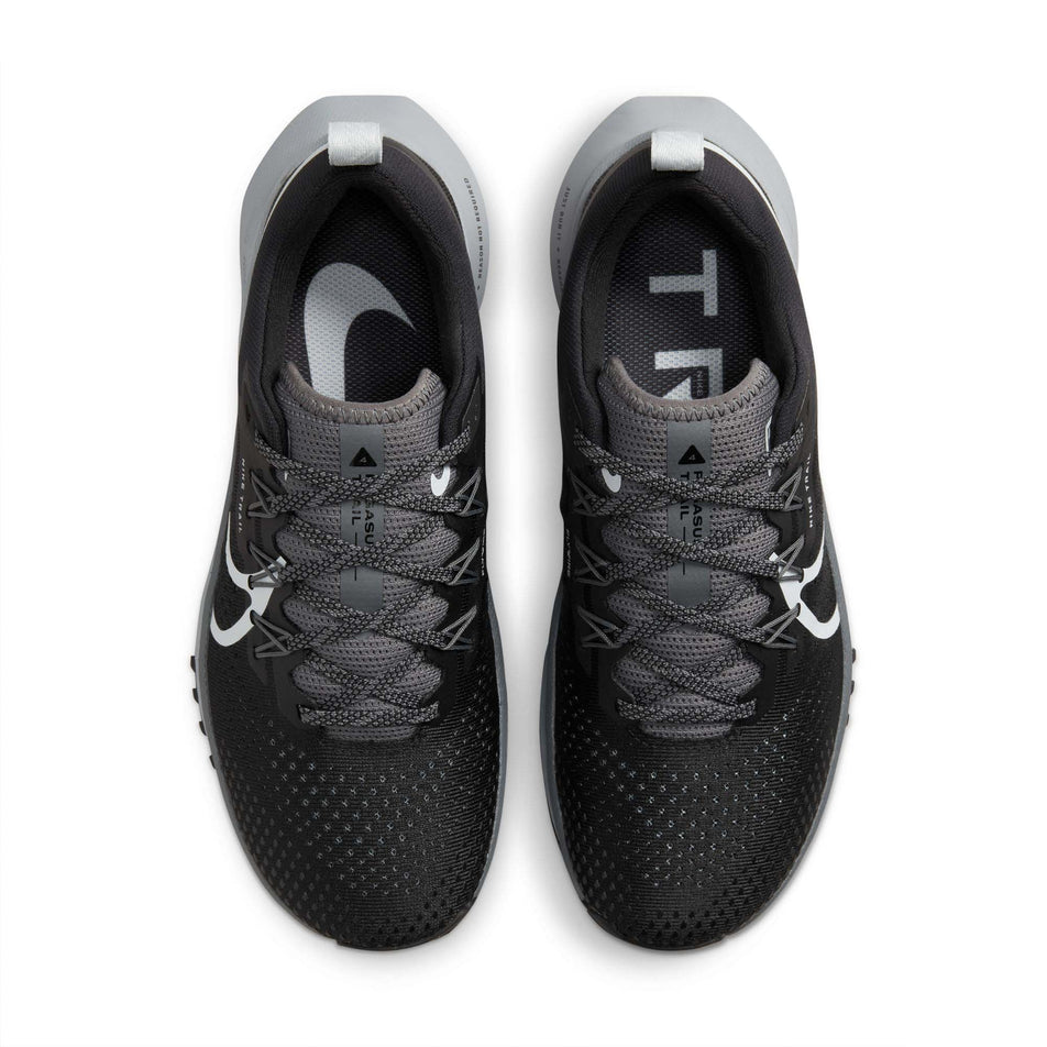 Pair upper view of Nike Women's React Pegasus Trail 4 Running Shoes in black. (7728658645154)